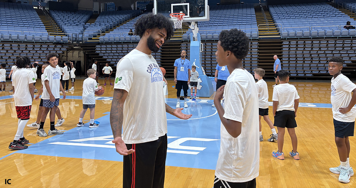 Coby White Giving Back, Sharing Message at Smith Center Basketball Camp