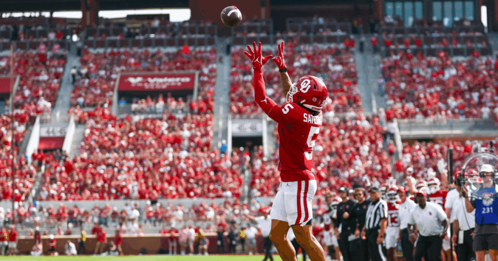 Isaiah Sategna catches a second-quarter touchdown against Auburn. (Photo by USA Today)