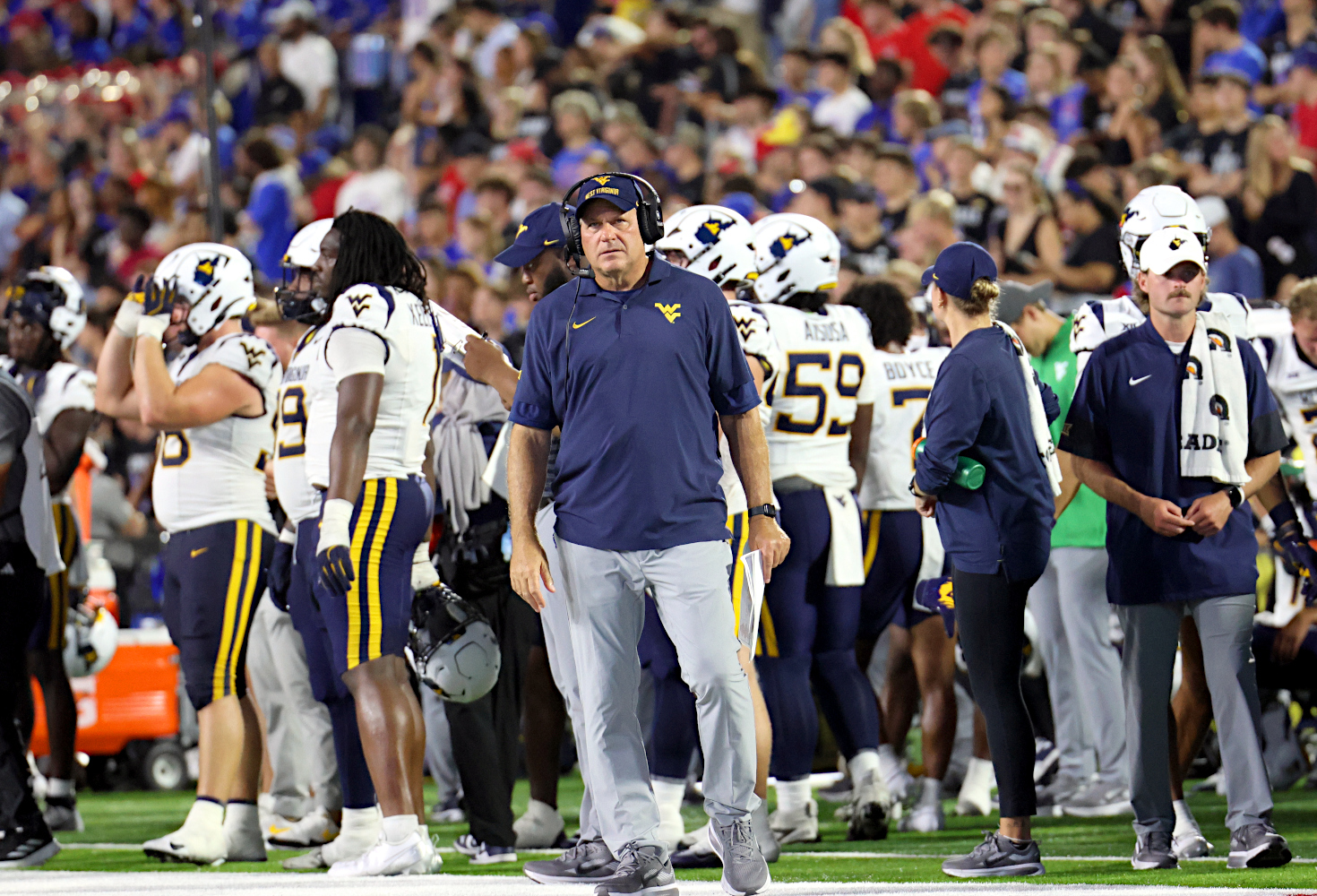 Rich Rodriguez navigating unique situation at quarterback