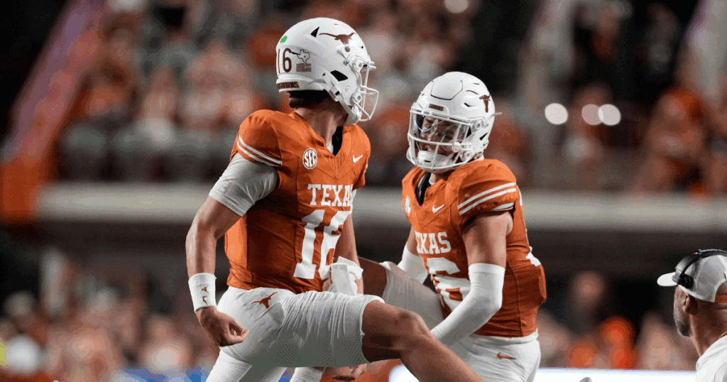 Sep 20, 2025; Austin, Texas, USA; Texas Longhorns quarterback Arch Manning (16) and defensive back Michael Taaffe (16) celebrate after Manning ran for a touchdown during the first half against the Sam Houston Bearkats at Darrell K Royal-Texas Memorial Stadium.