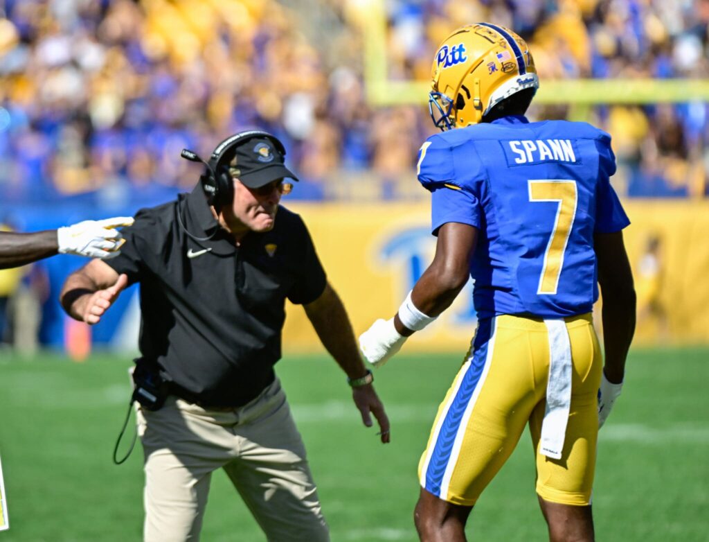 Pat Narduzzi and wide receiver Deuce Spann celebrate a Pitt touchdown. Oct. 4, 2025 - Ed Thompson