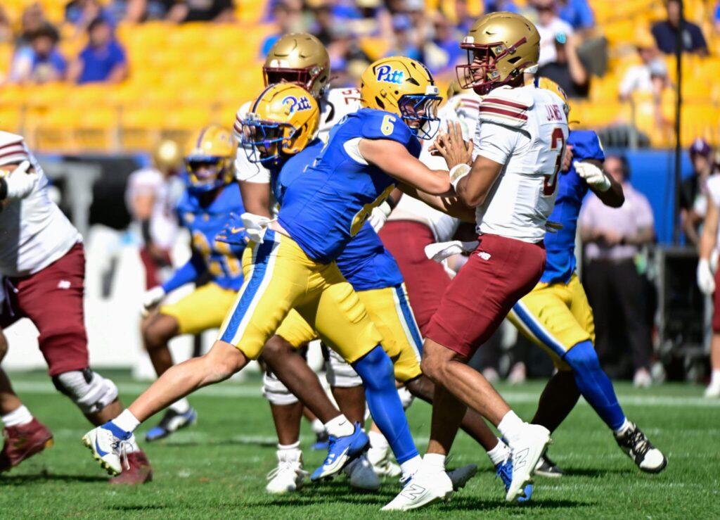 Pitt defensive end Nate Temple lays a hit on Boston College quarterback Grayson James. Oct. 4, 2025 - Ed Thompson
