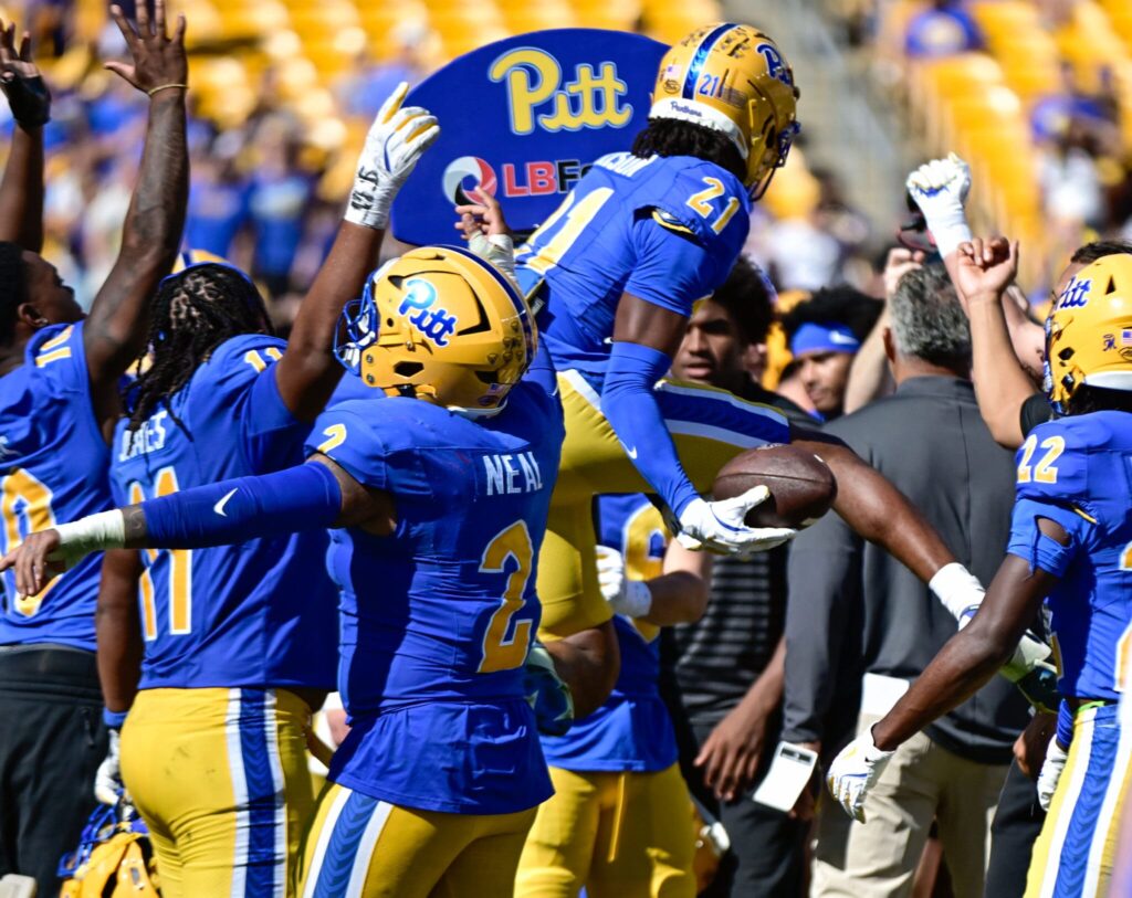 Cornerback Shadarian Harrison goes to dunk on the Panthers' turnover hoop. Oct. 4, 2025 - Ed Thompson / PSN