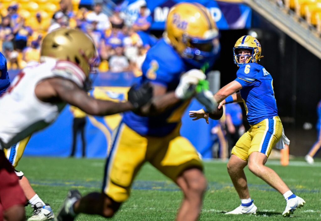 Pitt freshman quarterback Mason Heintschel looks downfield in his first start. Oct. 4, 2025 - Ed Thompson / PSN