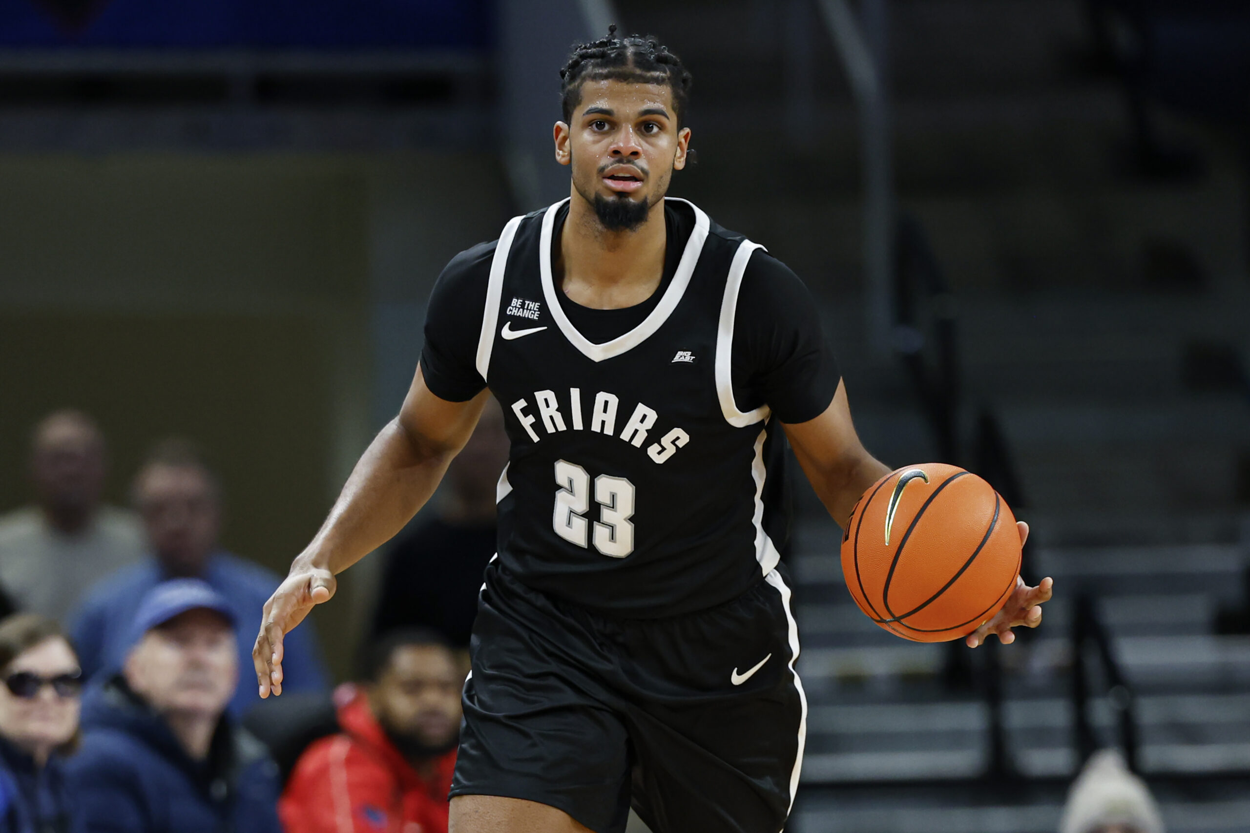 Dec 10, 2024; Chicago, Illinois, USA; Providence Friars forward Bryce Hopkins (23) brings the ball up court against the DePaul Blue Demons during the second half at Wintrust Arena. Mandatory Credit: Kamil Krzaczynski-Imagn Images