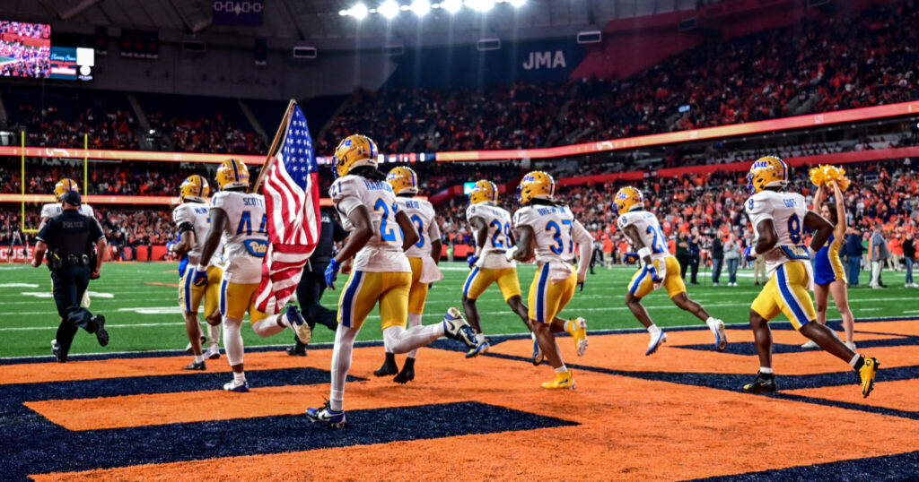 Pitt football takes the field at the JMA Wireless Dome ahead of its matchup against Syracuse. Oct. 18, 2025 - Ed Thompson / PSN