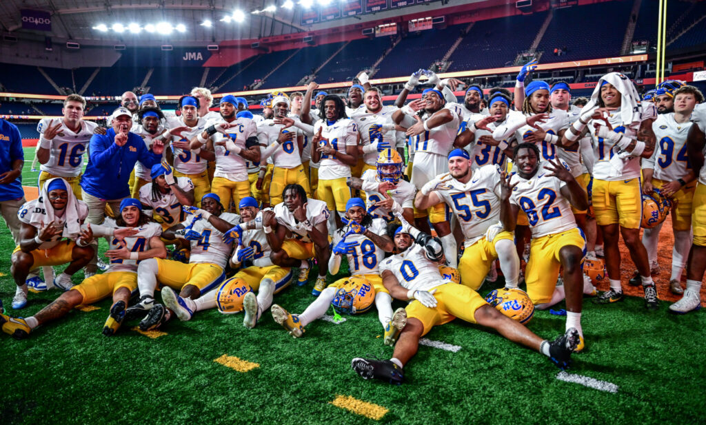 Pitt football posses for a team picture after a 30-13 win at Syracuse. Oct. 18, 2025 - Ed Thompson / PSN