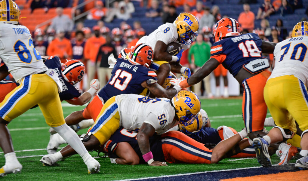 Pitt running back Juelz Goff (8) runs through a pile of players against Syracuse. Oct. 18, 2025 - Ed Thompson / PSN