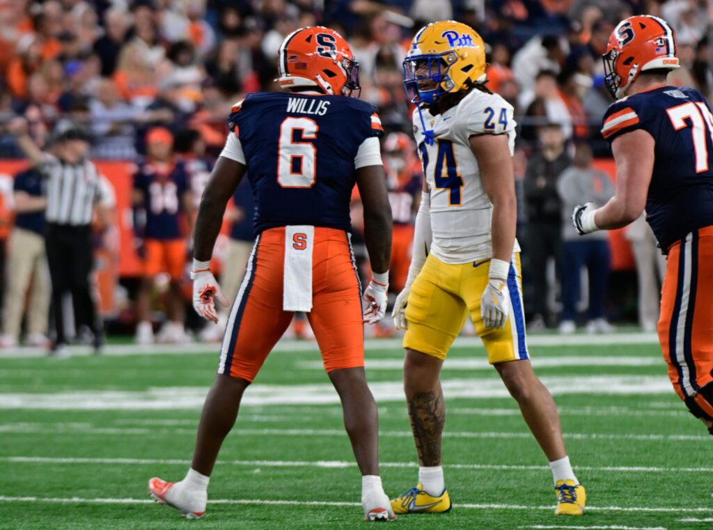 Linebacker Cameron Lindsey stares down former Pitt commit and current Syracuse running back Yasin Willis. Oct. 18, 2025 - Ed Thompson / PSN