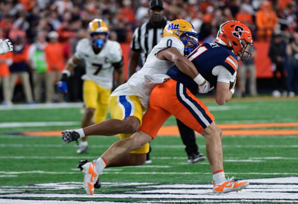 Linebacker Braylan Lovelace tackles Syracuse quarterback Luke Carney. Oct. 18, 2025 - Ed Thompson / PSN
