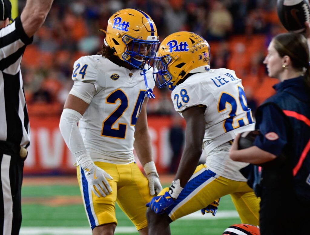 Linebacker Cameron Lindsey (24) and cornerback Shawn Lee Jr. celebrate following a defensive play. Oct. 18, 2025 - Ed Thompson / PSN