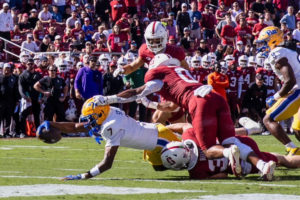 Nov 1, 2025; Stanford, California, USA; Pitt Panthers wide receiver Deuce Spann (7) scores a touchdown against the Stanford Cardinal during the second quarter at Stanford Stadium. Mandatory Credit: John Hefti-Imagn Images