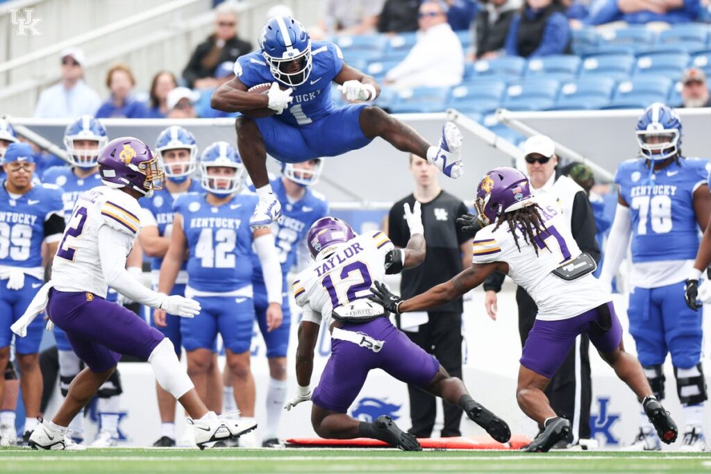 Kentucky WR Kendrick Law hurdles a Tennessee Tech defender, via UK Athletics 