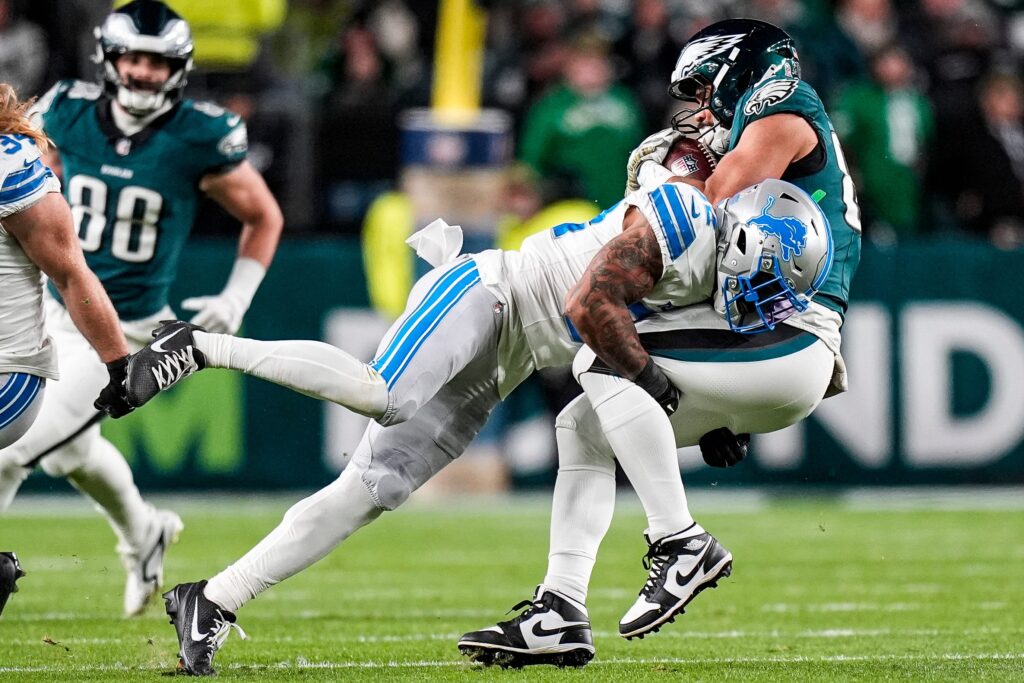 Detroit Lions safety Brian Branch (32) tackles Philadelphia Eagles tight end Kylen Granson (83) during the first half at Lincoln Financial Field in Philadelphia on Sunday, November 16, 2025.