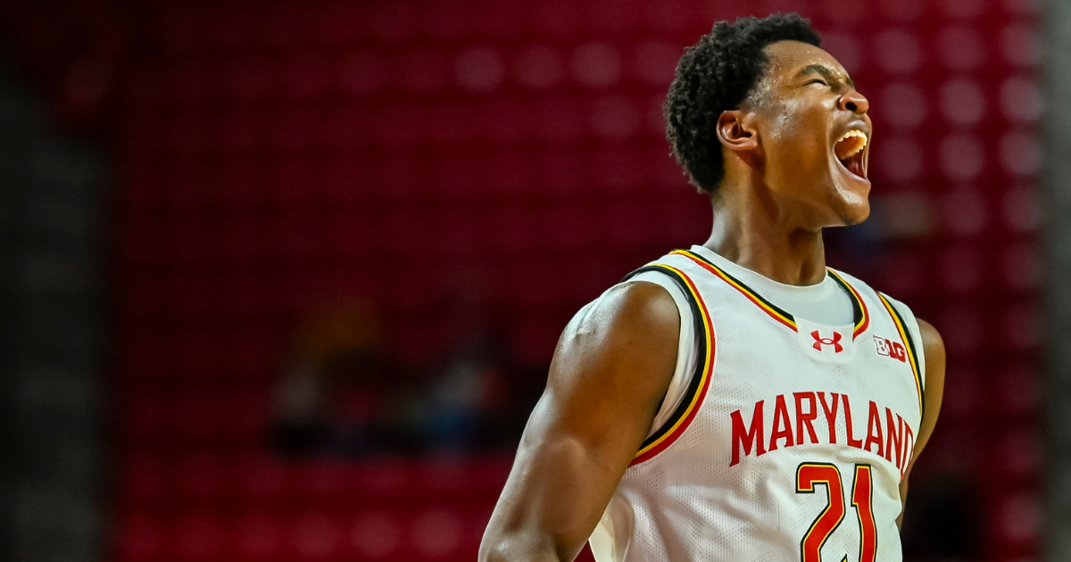 Maryland forward Pharrel Payne helped off court after suffering injury vs. Michigan