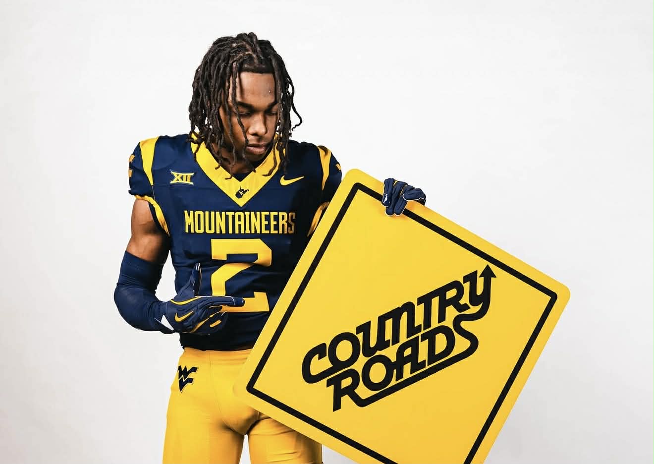 West Virginia rebuilds wide receiver room