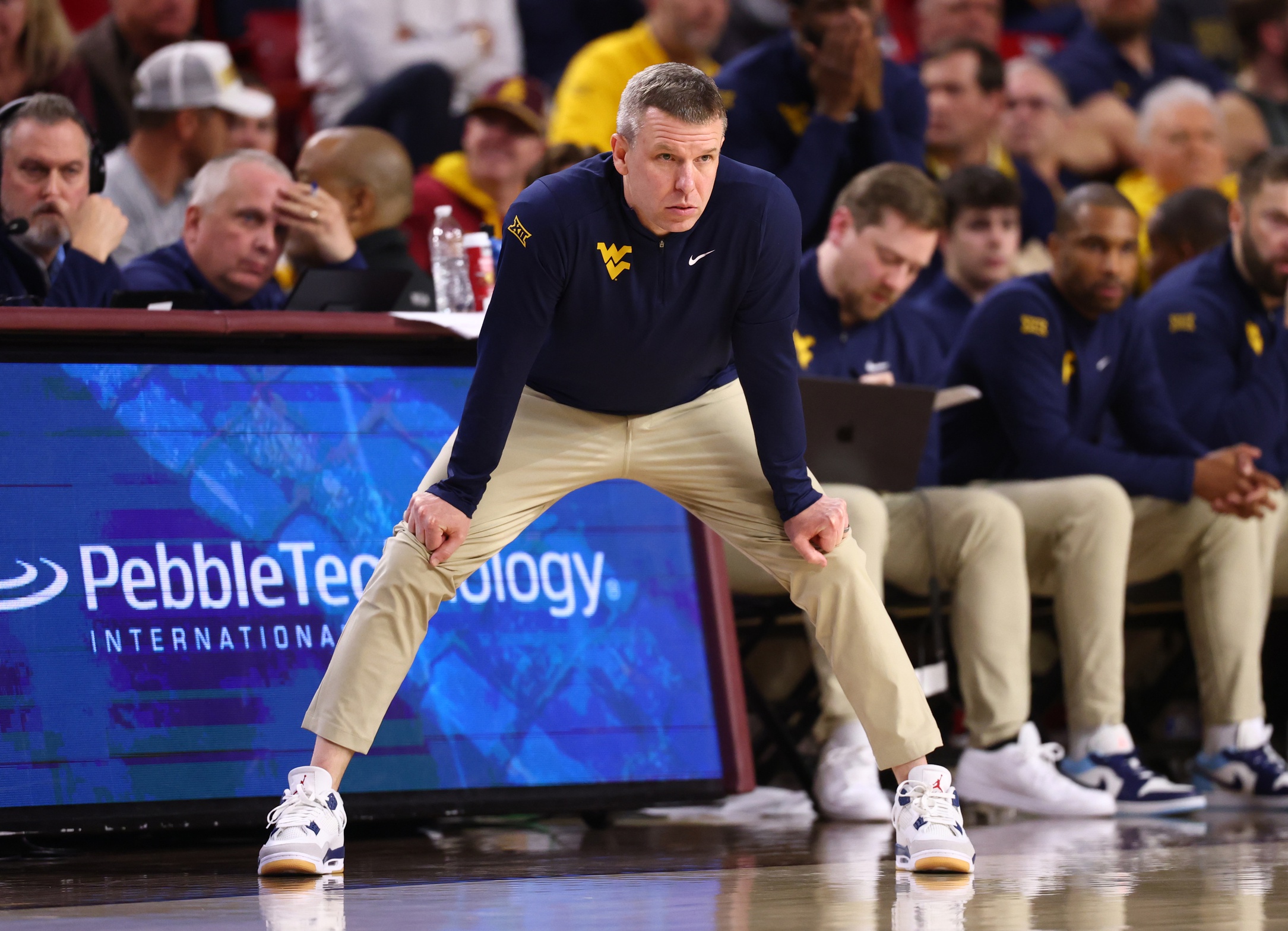 Key contributions on both ends lead West Virginia to first road win