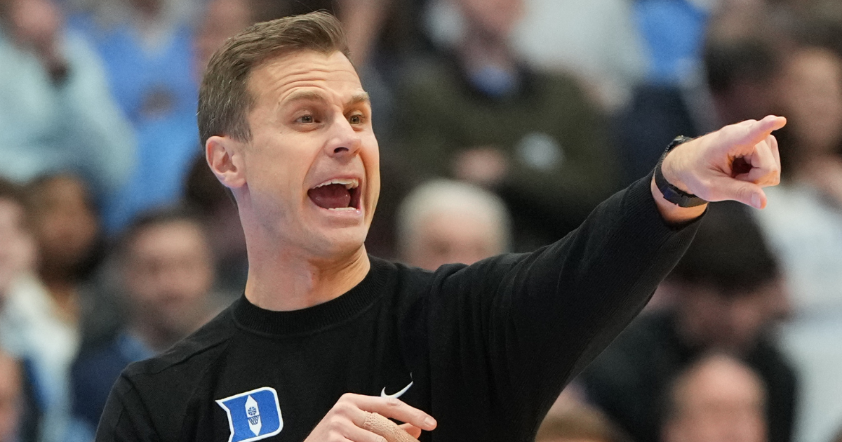 Jon Scheyer claims staff members punched in face during UNC premature court storm