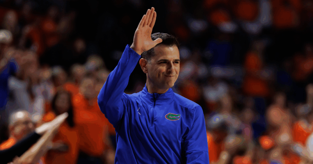 Feb 14, 2026; Gainesville, Florida, USA; Florida Gators head coach Todd Golden gestures with a Gator Chomp against the Kentucky Wildcats during the second half at Exactech Arena at the Stephen C. O'Connell Center. Mandatory Credit: Matt Pendleton-Imagn Images