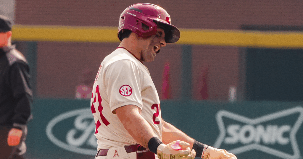 Arkansas catcher Ryder Helfrick rounds the bases in Game 3 against UT Arlington