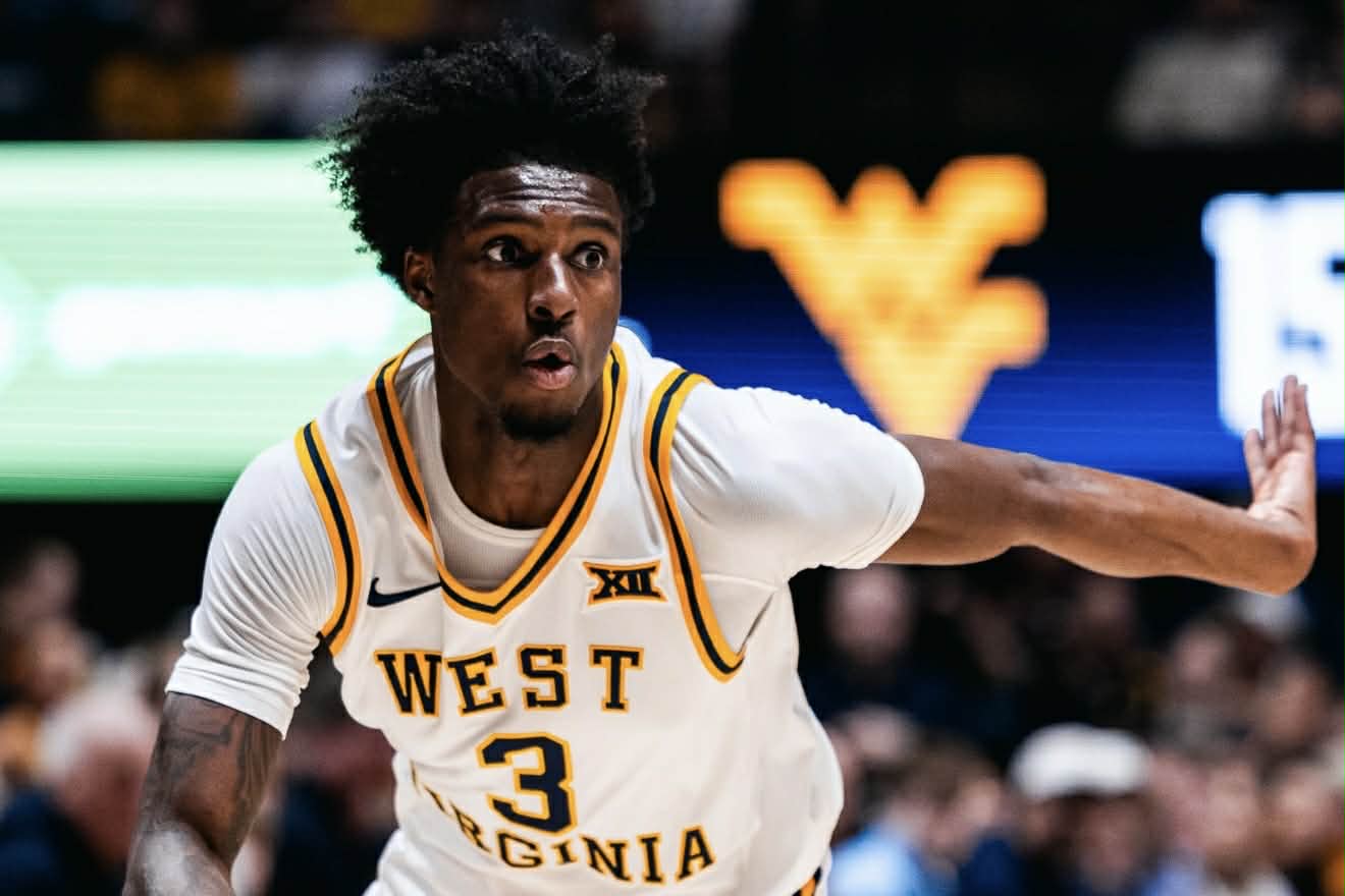 West Virginia beats UCF 77-62 on Senior Night