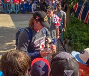 Hunter Signs Baseballs for the Kids.jpg