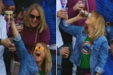 MAIN-Woman-Catches-Baseball-In-Beer-At-Cubs-Game.jpg