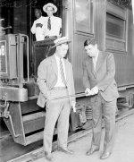 Lou_Gehrig_and_Babe_Ruth,New_York_Yankees,_standing_in_front_of_a_passenger_train_car_in_a_rai...jpg