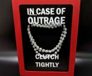 in-case-of-outrage-clutch-tightly-pearl-necklace.jpg