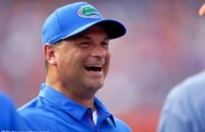 University-of-Florida-co-offensive-coordinator-Billy-Gonzales-laughing-on-the-field-prior-to-t...jpg