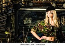 beautiful-girl-on-camouflage-outfit-260nw-174511334.jpg
