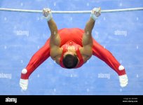 artistic-gymnastics-high-bar-birds-view-AKY85W-2785404494.jpg