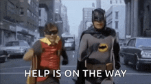 batman-and-robin-running-away.gif